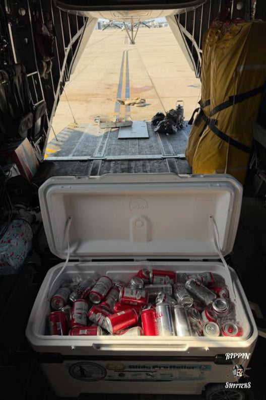 Open cooler with drinks and equipment on a white background